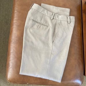 Tan color pair of pants flat front
